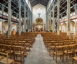 -Church;-Church-interior;-Exposed-metal-frame;-Gallery;-Industrial-architecture;-Jules-Astruc;-Kaleidos;-Kaleidos-images;-La-parole-à-limage;-Nave;-Notre-Dame-du-Travail-church;-Panelled-vault;-Parisian-heritage;-Places-of-worship;-Rush-seat-chair;-Stained-glass;-Stories-Pictures;-Tarek-Charara